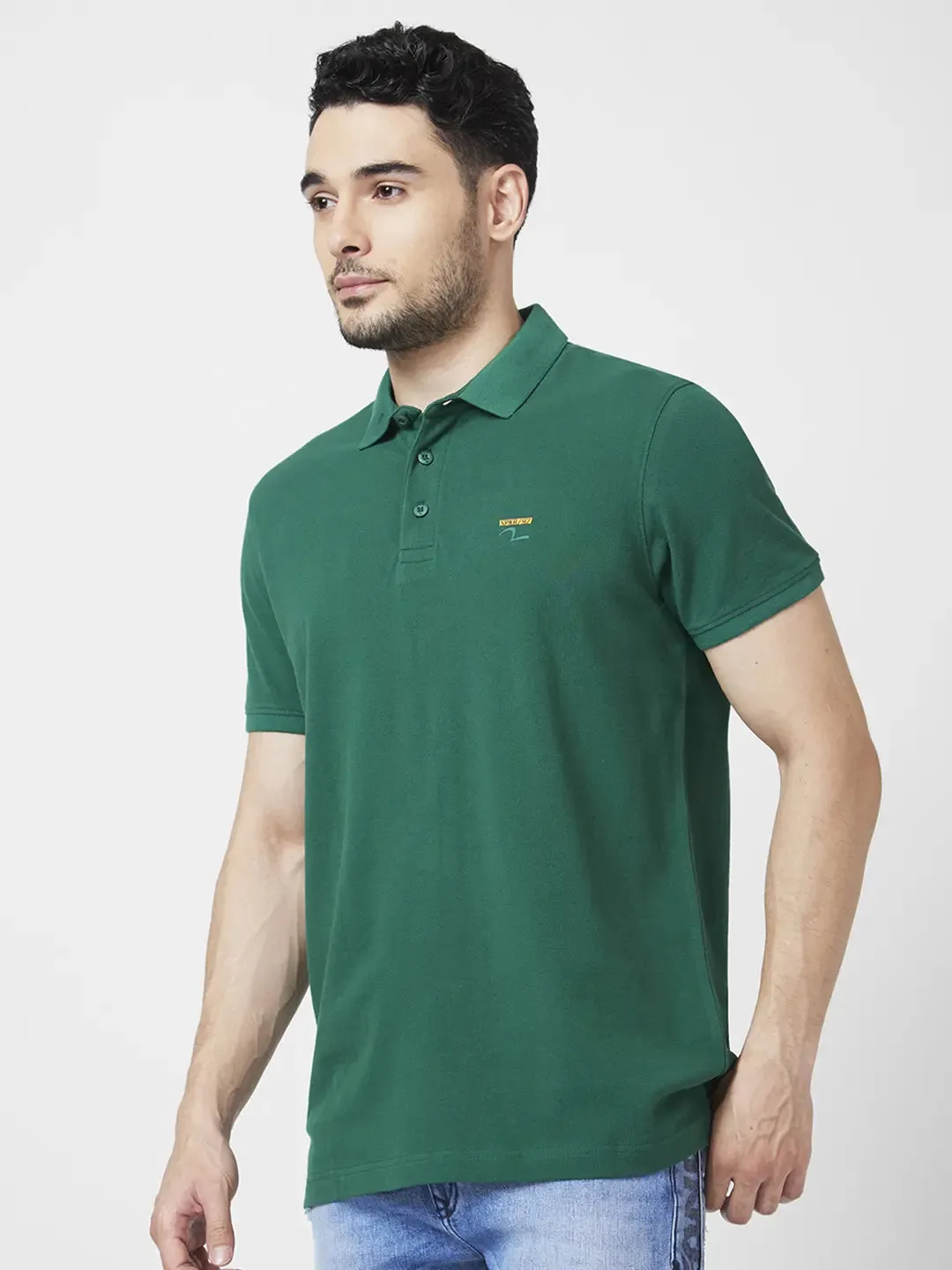 Spykar Men Dark Green Cotton Slim Fit Half Sleeve Polo Neck Plain Tshirt